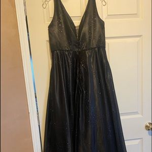 Black Prom dress new with tag has a black/Silver glitter in it